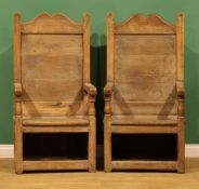 A pair of substantial Arts & Crafts period oak panel back armchairs, in the 17th century taste,