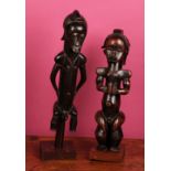 Tribal Art - a Fang reliquary figure, depicted crouched, brass eyes, Gabon/Cameroon, 64cm high