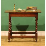 An 18th century vernacular oak side table, oversailing rectangular top, bobbin-turned and blocked