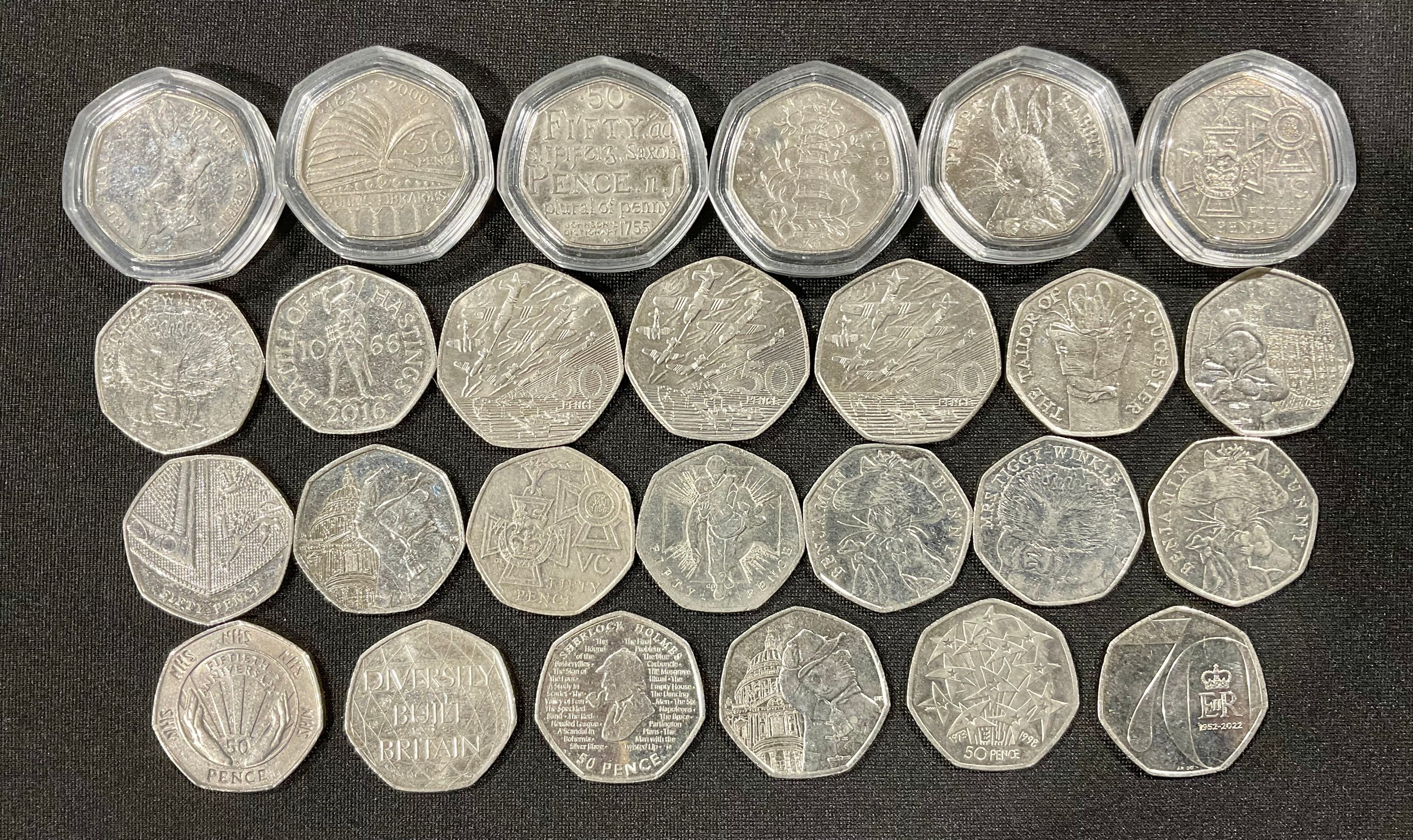 Numismatics - a collection of twenty six fifty Pence pieces (50Ps) inc ...