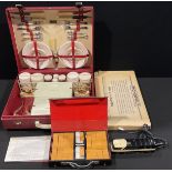 A Mah-Jong set, cased; a Monopoly board game; a part fitted Brexton picnic hamper; a novelty