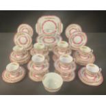 A Crown Staffordshire Lyric Tunis pattern tea service for twelve, comprising pedestal comport,