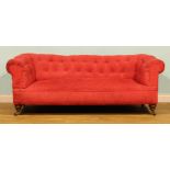 A Victorian Chesterfield sofa, by Howard & Sons (fl.1820-1925), stamped, stuffed-over upholstery,