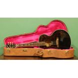 A Gibson J-180AE acoustic guitar, the label printed Gibson Model J-180AE 69/100, Number 91981014 and