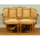 A French Hepplewhite Revival giltwood sofa, 86cm high, 138.5cm wide, the seat 114cm wide and 56cm