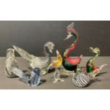 Seven studio glass paperweights in the form of birds including a millefiori parakeet example, Murano