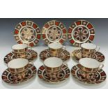 A Royal Crown Derby 1128 Old Imari tea service for six comprising a set of six tea cups and saucers,