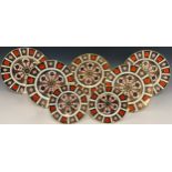 Royal Crown Derby 1128 Old Imari plates comprised of, two medium plates, three smaller, two side