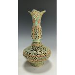 A Hungarian Moravia reticulated vase, in the manner of Zsolnay Pecs, glazed in tones of turquoise