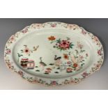 An 18th century Chinese shaped oval Double Peacock dish, decorated in polychrome enamels, 28cm wide,