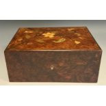An Art Nouveau amboyna and marquetry rectangular jewellery box, hinged cover inlaid with a flowering
