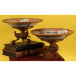 A pair of 19th century French ormolu mounted Chinese porcelain plates, decorated with polychrome