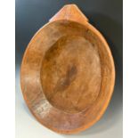 Treen - A 19th century dug-out softwood preparation or dough proving bowl, single lug handle,