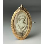 A 19th century Mourning brooch / pendant, set with a portrait miniature of a lady, in watercolour en