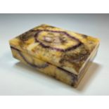A Blue John rectangular lidded cigarette or cigar box, the hinged lid enclosing a white marble lined