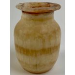 An Egyptian alabaster ovoid jarlet, 11.5cm high