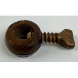 Treen - a 19th century boxwood screw-action travelling pocket nut cracker, 9cm long