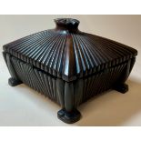 A 19th century Anglo-Indian mahogany fluted sarcophagus box and cover, 13cm wide