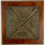 A mid-century bronze commemorative sporting plaque, monogrammed LBC [Loughborough Boat Club, est.
