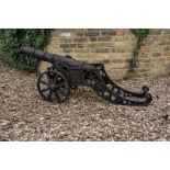 A magnificent and highly decorative cast iron cannon cast in the manner of an 18th century field