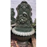 A magnificent classical cast iron wall font featuring a beautifully modelled classical female