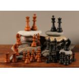 A boxwood and ebonised Staunton pattern chess set, the kings 9cm high overall, unweighted