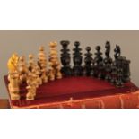 A boxwood and ebonised Calvert or St. George type chess set, the kings 8.5cm high overall