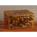 A 19th century decoupage rectangular work box, decorated with birds amongst flowering branches,