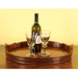 An early 20th century Dutch brass bound mahogany and oak oval tray, 52cm wide