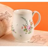 A Worcester bell shaped mug, painted in polychrome with flowers and scattered sprigs, brown line
