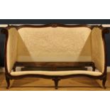 A 19th century French Provincial oak daybed, in the Louis XV taste, the later sprung base by Heal’