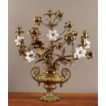 A 19th century gilt brass and opaque glass five-light candelabra, as vase of flowers, the urn cast
