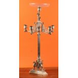 An early 20th century silver plated and cut glass five-branch candelabra centrepiece, in the Regency