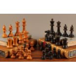 A boxwood and ebonised Staunton pattern chess set, the kings 8cm high, weighted