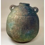 A ‘Graeco-Roman’ Palestinian bag-jar amphora of globular ribbed form twin loop carrying handles,