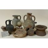 Antiquities & Egyptology - A group of utilitarian wares including a 4th century A.D pottery oil lamp