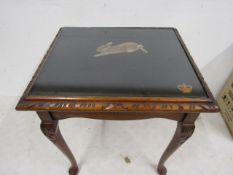 Original oil by James Allen on small coffee table with glass protection