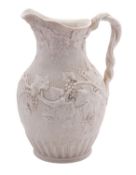 A 19th century Parian vine pattern jug with entwined vine branch handle and moulded in relief with
