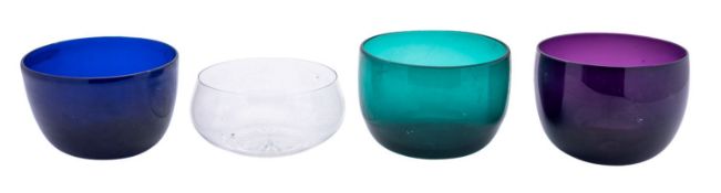 A collection of blue, green, amethyst and clear glass finger bowls,