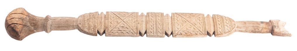 A North West African Tuareg carved wood tent peg,