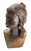 An East African sculpted stone bust of a young man,