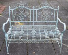 A painted wrought iron and wirework garden bench,