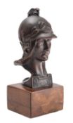 A Continental patinated bronze bust of Minerva, early 20th century; portrayed as helmeted,