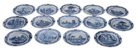A set of fourteen Dutch delft wall plaques,