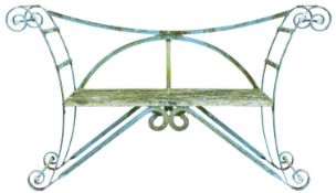 A painted wrought iron garden bench, 20th century; openwork throughout, with strapworked back,