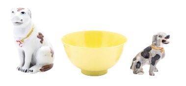 A Chinese porcelain yellow ground sgrafitto bowl, decorated with dragons chasing pearls,