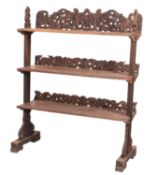 An Anglo Indian carved and stained hardwood buffet or etagere,