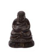 A small Thai bronze figure of Maha Katyayana, 18th/19th century seated on a double lotus throne,