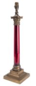 A ruby glass and brass mounted columnar table lamp,