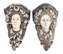 A pair of Victorian plaster wall brackets modelled with maidens' masks,